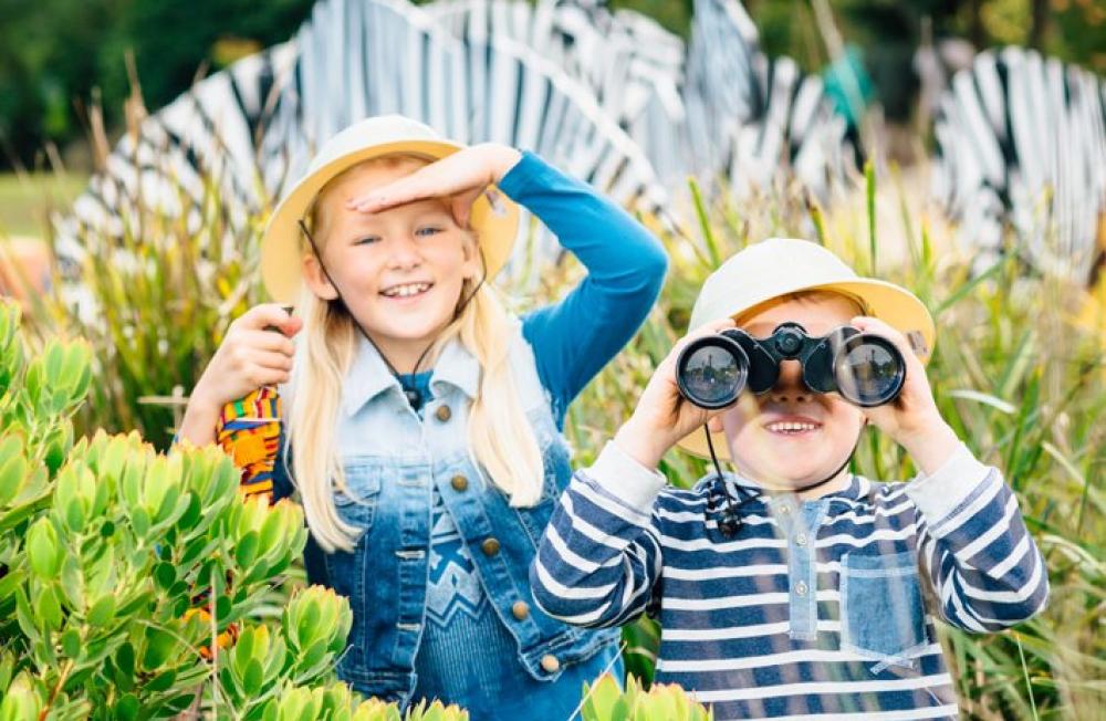 Children exploring zoo pathways