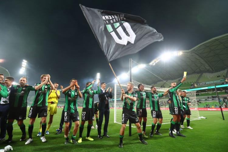 Western United A-League Players celebrating win 